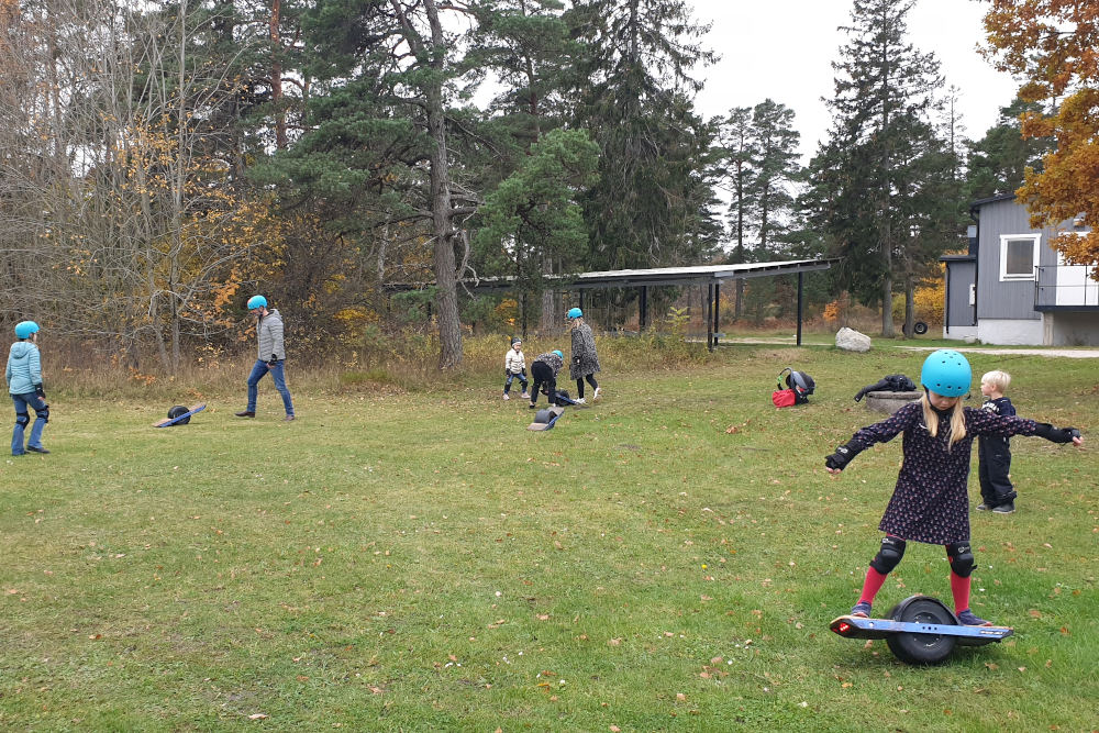 familj på onewheel